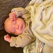 Lennox joined the competition — help win amazing prizes! baby, blanket, child, comfort, cozy, cushion, cute, face, furniture, indoors, infant, knitted_sweater, peaceful, portrait, relaxing, resting, sleeping, soft, toddler, warm