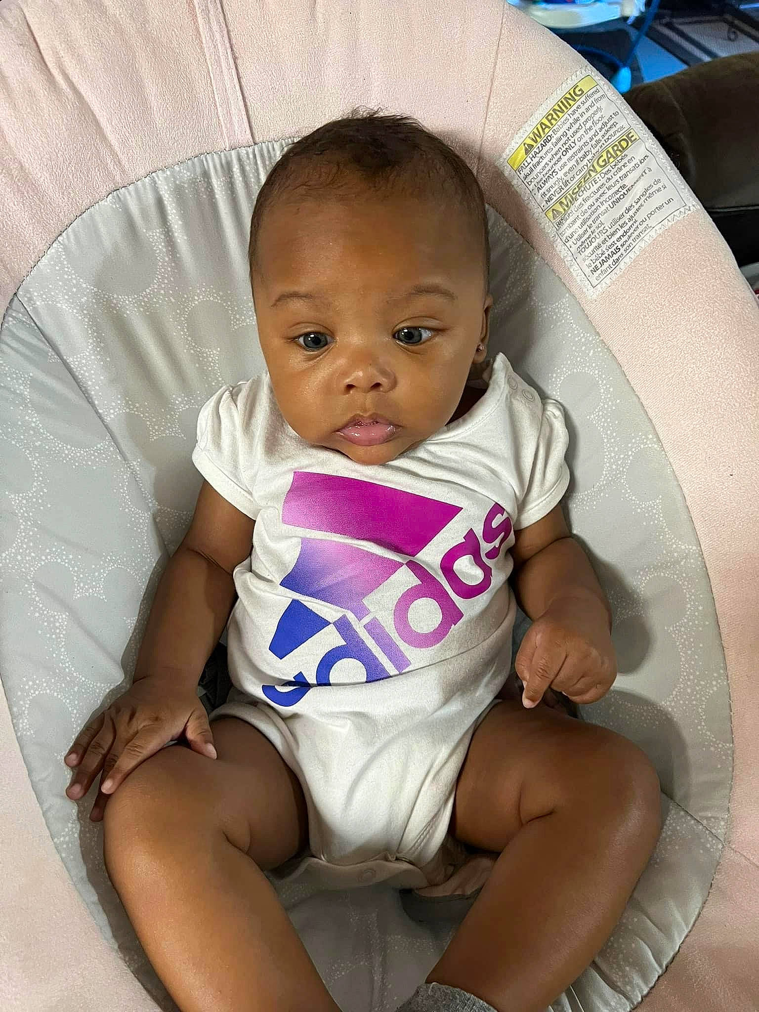 Kehlani joined the competition — help win amazing prizes! baby, baby_products, baby_safety, baby_toddler_clothing, chair, cheek, child, circle, comfort, happy, human_leg, iris, knee, leg, linens, person, sitting, skin, sleeve, thigh