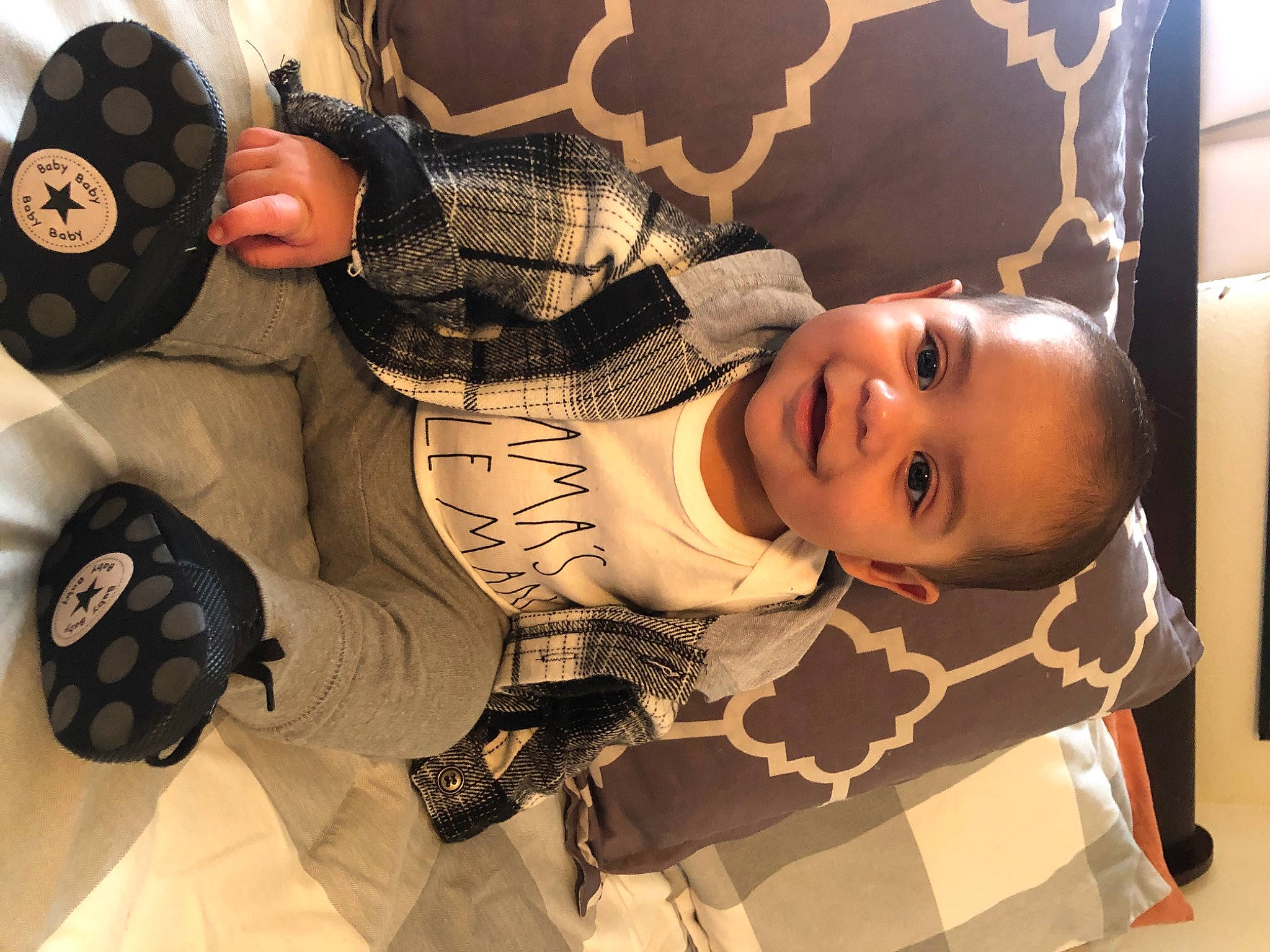 Nathaniel is registered to the contest to win money with this photo: art, automotive_tire, baby, baby_products, black_hair, child, fashion_accessory, fictional_character, flash_photography, hairstyle, happy, hat, joy, mouth, pattern, person, personal_protective_equipment, room, smile, toddler