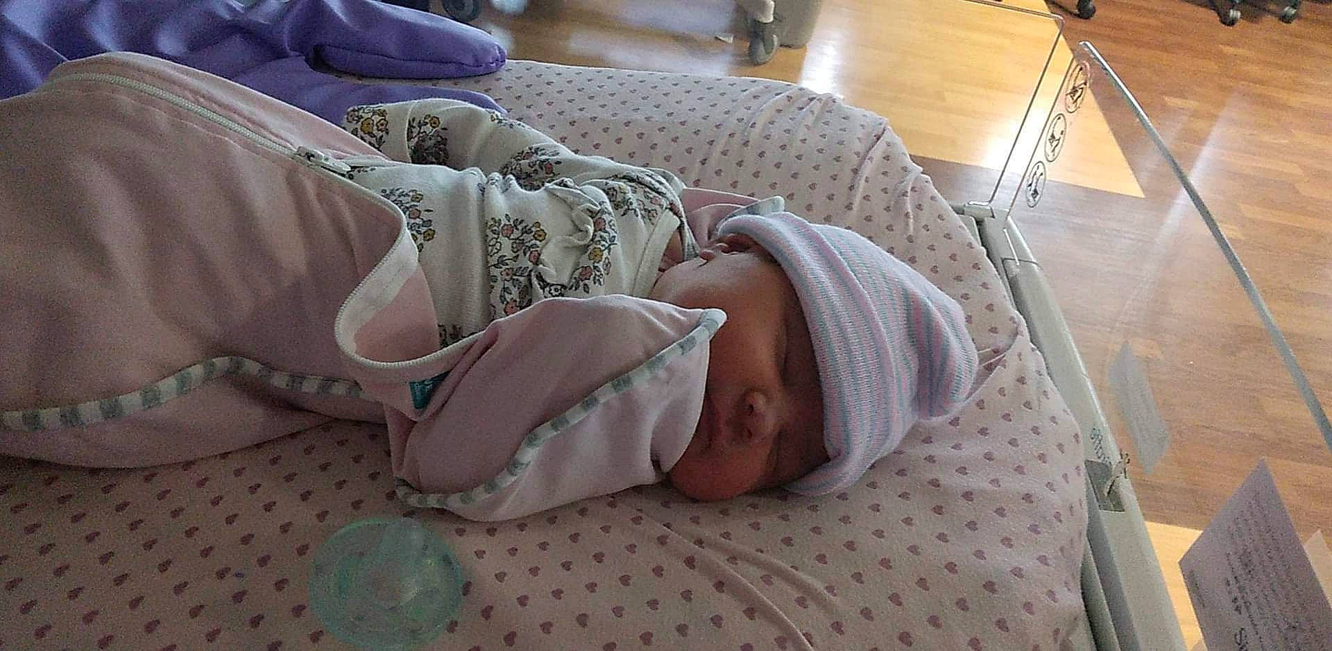 Dahlia is registered to the contest to win money with this photo: baby, baby_products, baby_safety, baby_sleeping, baby_toddler_clothing, bedding, bedtime, blanket, child, comfort, couch, flooring, headwear, linens, nap, pattern, person, room, sleep, toddler