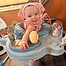 Everleigh is registered to the contest to win money with this photo: baby, infant, smiling, headscarf, baby_walker, toys, indoor, floor, wooden_floor, child, cute, play, person, happy, reaching, pink, blue, orange_wall, window, sunlight