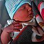 newborn, baby, sleeping, blanket, hat, hand, cozy, closeup, infant, soft, warm, cute, person, resting, indoor, portrait, child, comfort, peaceful, tiny