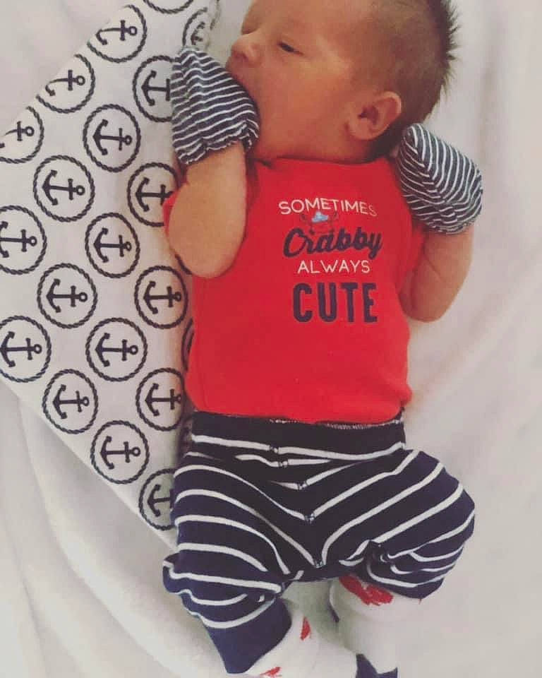 Wade joined the competition — help win amazing prizes! active_pants, arm, baby_toddler_clothing, black, clothing, hand, happy, joint, mammal, neck, nose, organ, outerwear, person, shoulder, skin, sleeve, standing, t_shirt, textile