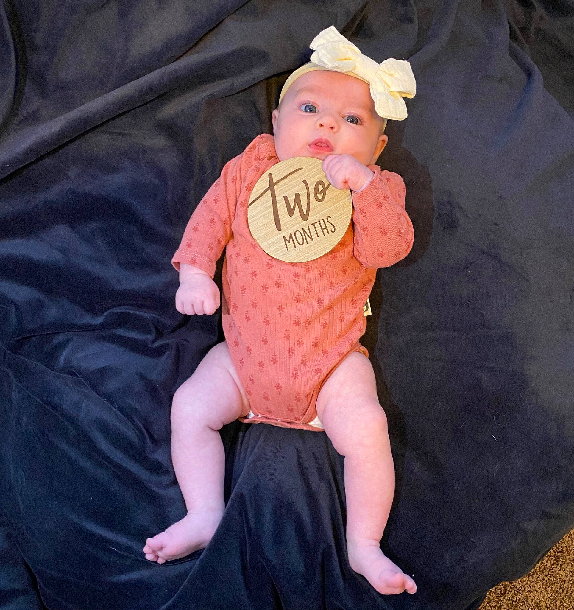 Preslee joined the competition — help win amazing prizes! arm, baby, baby_toddler_clothing, cap, cheek, child, comfort, costume_hat, doll, head, linens, pattern, person, pink, sitting, skin, sleeve, stuffed_toy, textile, toddler