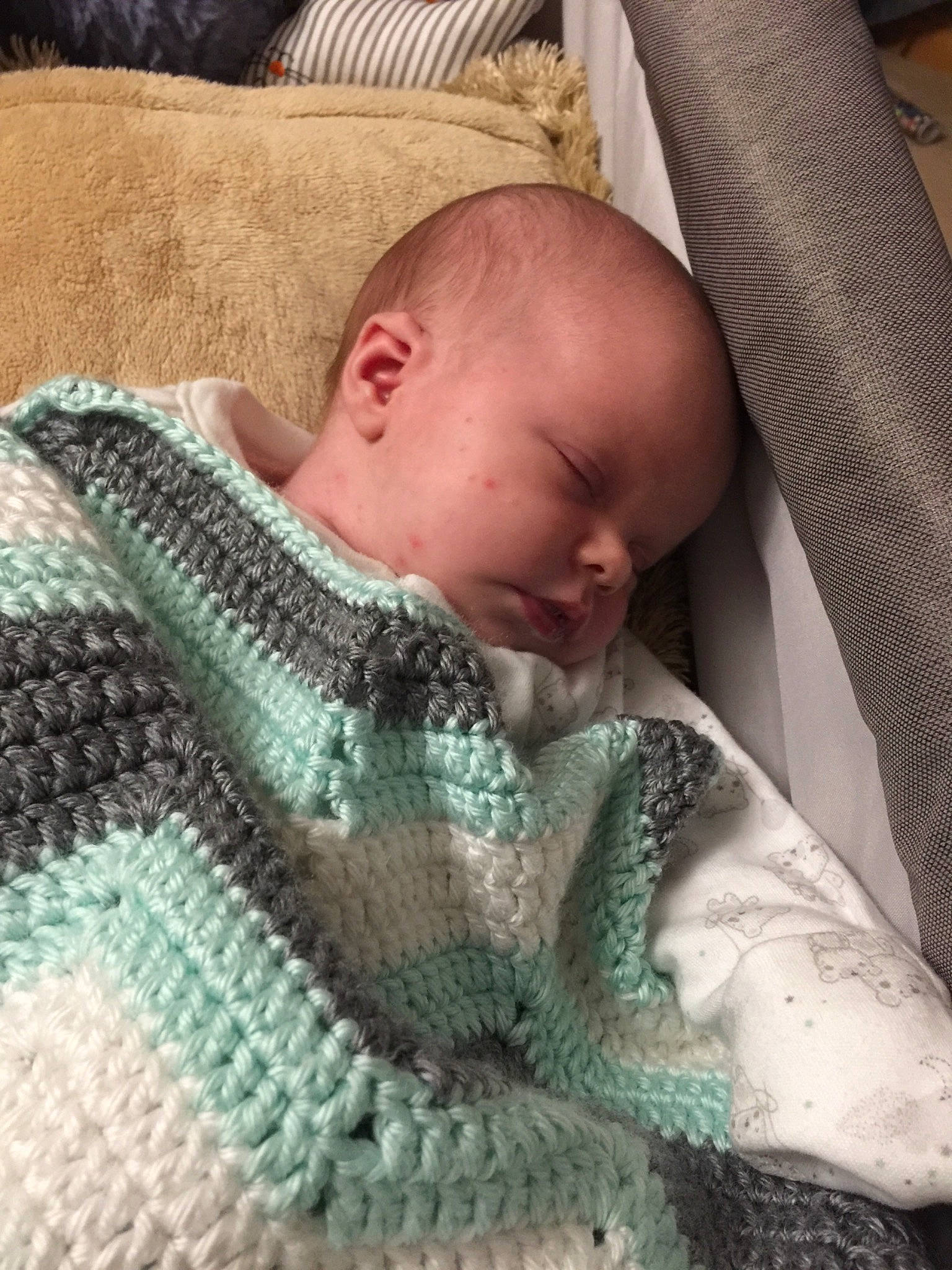 Aimee is registered to the contest to win money with this photo: blanket, child, crochet, infant, knitting, nap, person, product, sleep, textile, toddler, wool