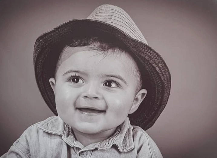 Naïl participe au concours pour gagner de l'argent avec cette photo : cheek, chin, clothing, eye, eyebrow, face, facial_expression, flash_photography, hairstyle, hat, head, human, joy, lip, mouth, nose, organ, person, skin, smile