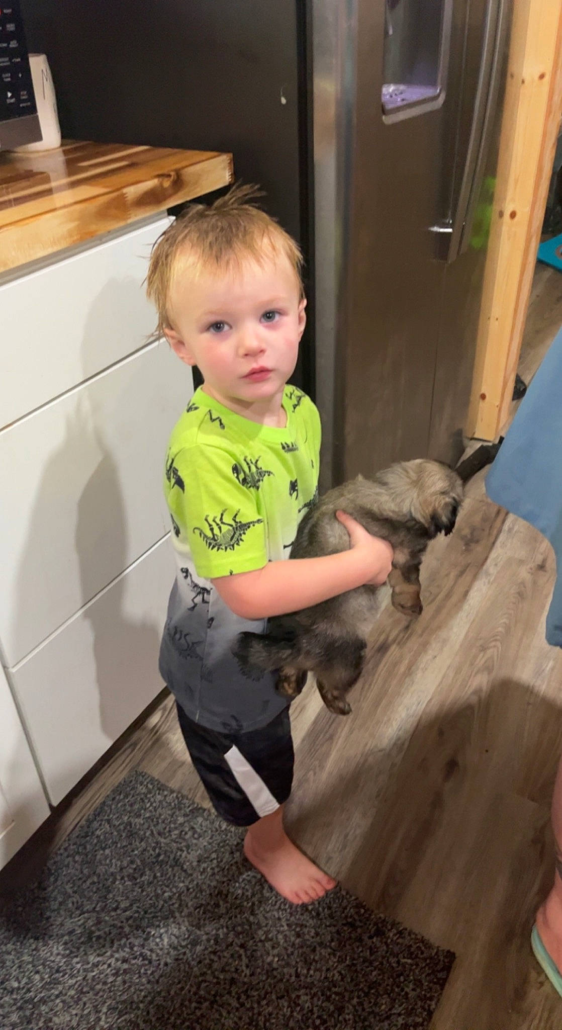 Taylor joined the competition — help win amazing prizes! baby_toddler_clothing, cabinetry, child, elbow, floor, flooring, fun, gas, hardwood, home_appliance, human_leg, knee, leg, person, play, room, sitting, sleeve, t_shirt, toddler