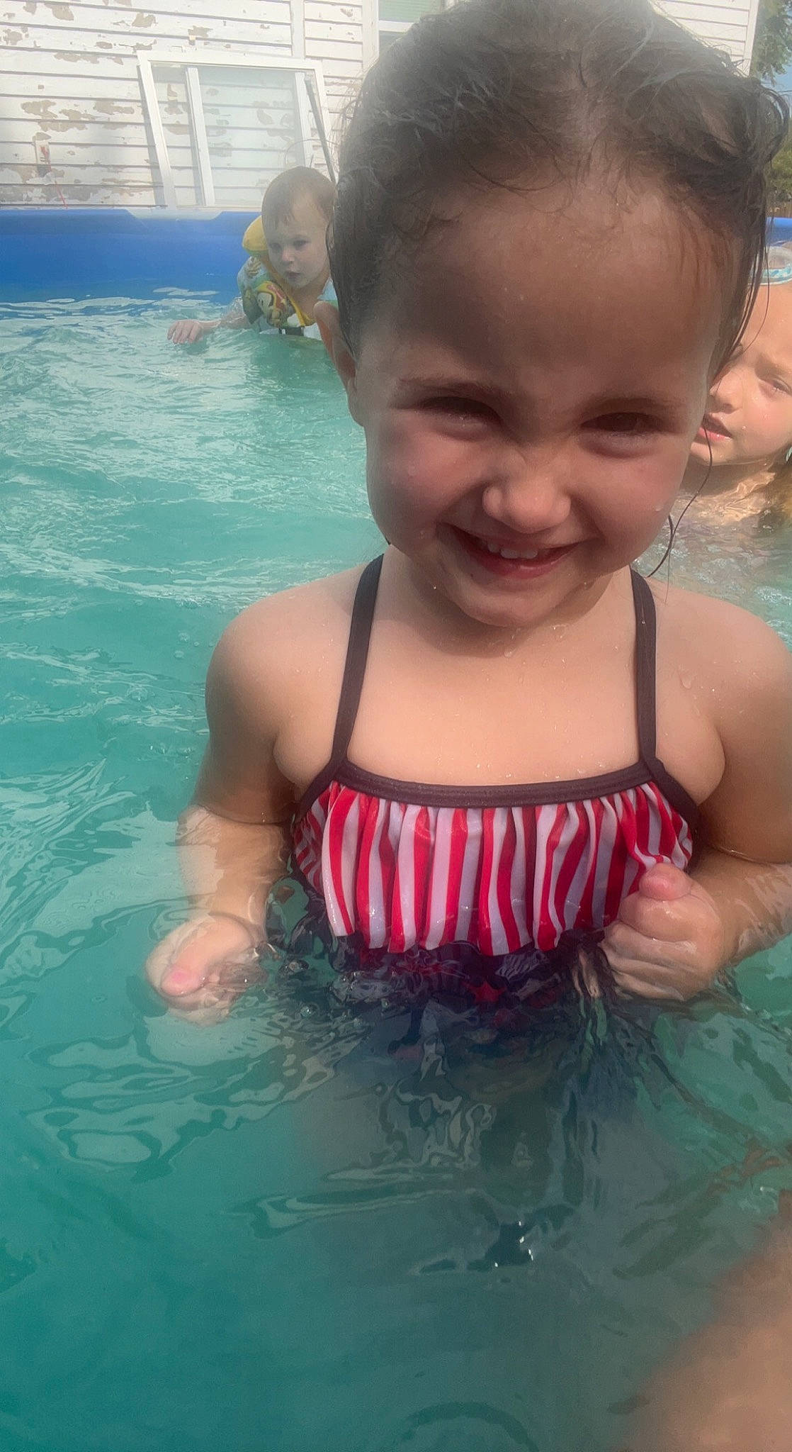 Sophie joined the competition — help win amazing prizes! aqua, bathing, chest, face, fun, hair, happy, head, headwear, joy, leisure, muscle, organ, person, personal_protective_equipment, recreation, skin, smile, summer, swimming_pool