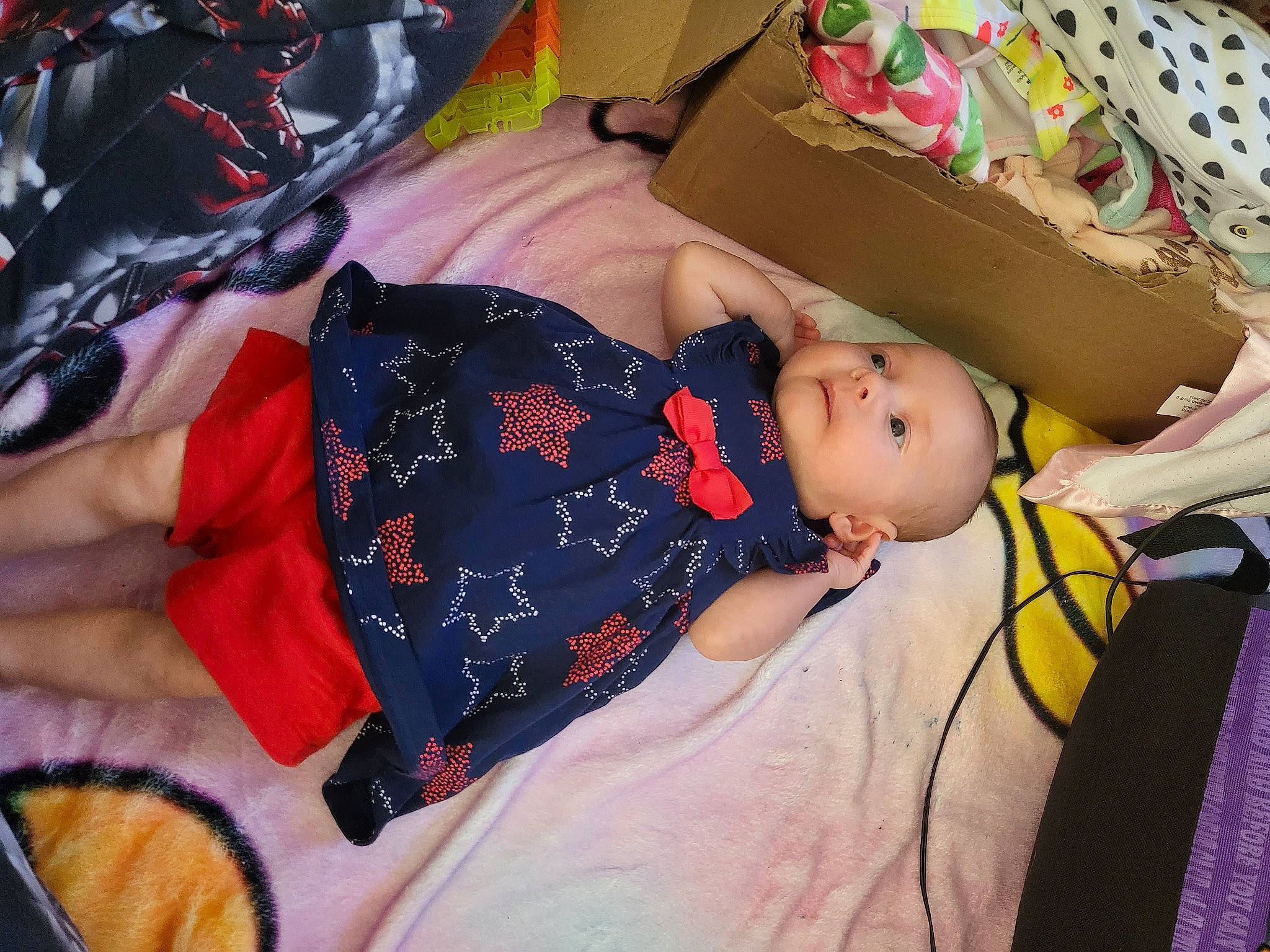 Lydia joined the competition — help win amazing prizes! baby, baby_carriage, baby_products, baby_toddler_clothing, cheek, child, comfort, fun, happy, hat, linens, pattern, person, room, sitting, toddler