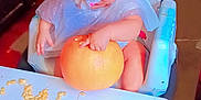 Anastasia joined the competition — help win amazing prizes! baby, bow, child, high_chair, pumpkin, pumpkin_seeds, table, indoor, mess, curious, plastic_cover, furniture, floor, seat, childhood, exploration, orange, headwear, person, toddler