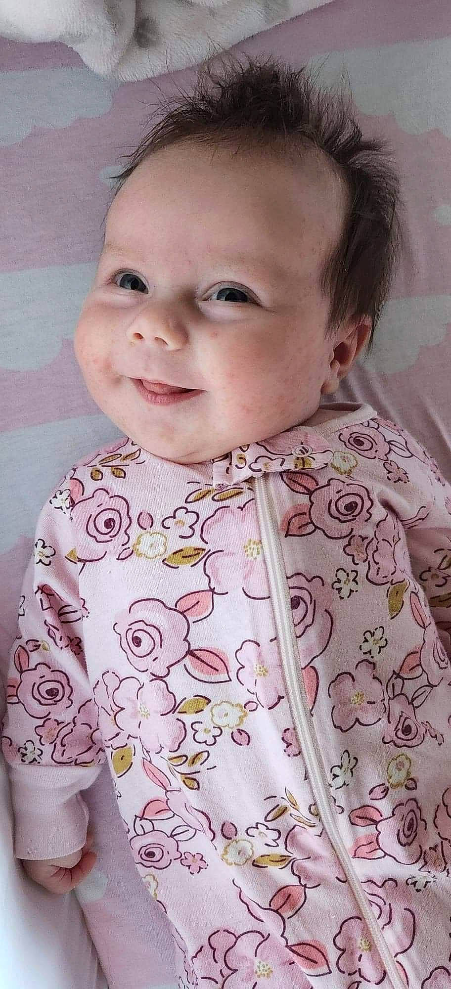 Camila is registered to the contest to win money with this photo: baby, baby_toddler_clothing, cheek, clothing, collar, dress, dress_shirt, eye, face, happy, lip, neck, nose, person, pink, shirt, skin, sleeve, smile, t_shirt