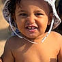 toddler, child, hat, bucket_hat, smiling, outdoor, sunlight, skin, face, expression, bare_chest, polka_dot, clothing, summer, nature, portrait, cute, young, person, happy