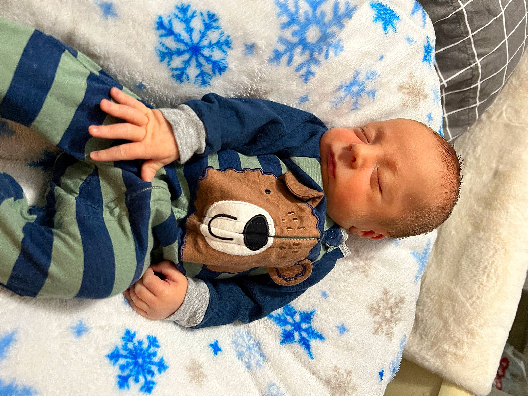 Hudson is registered to the contest to win money with this photo: baby, baby_products, baby_safety, baby_sleeping, baby_toddler_clothing, bedding, bedtime, blue, child, comfort, gesture, happy, hat, infant_bed, linens, pattern, person, room, thumb, toddler