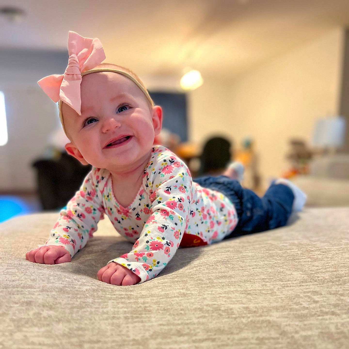 Lindi is registered to the contest to win money with this photo: arm, baby, baby_crawling, baby_toddler_clothing, cheek, comfort, crawling, eye, facial_expression, floor, flooring, fun, grass, happy, joy, leisure, person, sitting, sleeve, smile
