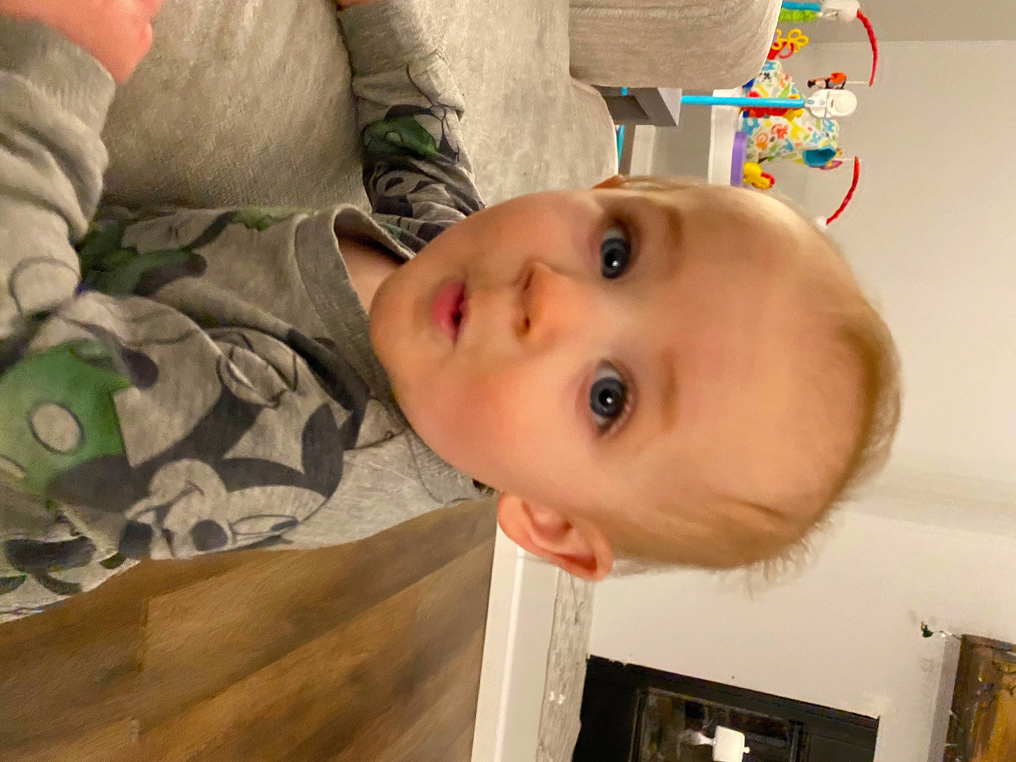 Lindi is registered to the contest to win money with this photo: baby, baby_toddler_clothing, cheek, child, eye, eyebrow, eyelash, face, facial_expression, fun, iris, military_camouflage, mouth, nose, person, picture_frame, skin, smile, surprise, toddler