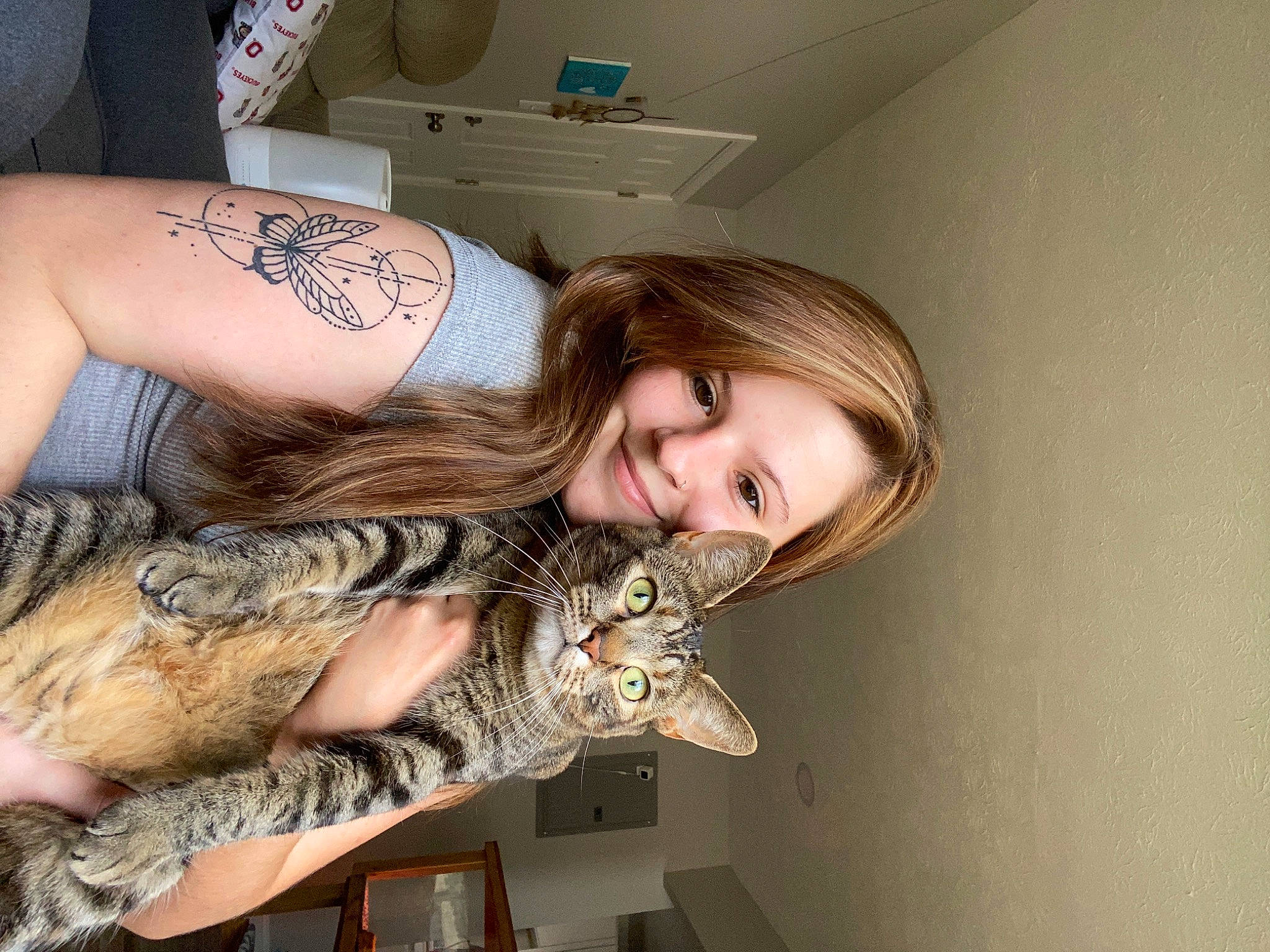 Hazel is registered to the contest to win money with this photo: brown_hair, chest, dress, elbow, eye, fashion_accessory, fashion_design, happy, human_leg, jewellery, neck, pattern, reptile, smile, tattoo, temporary_tattoo, thigh, trunk, visual_arts, wrist