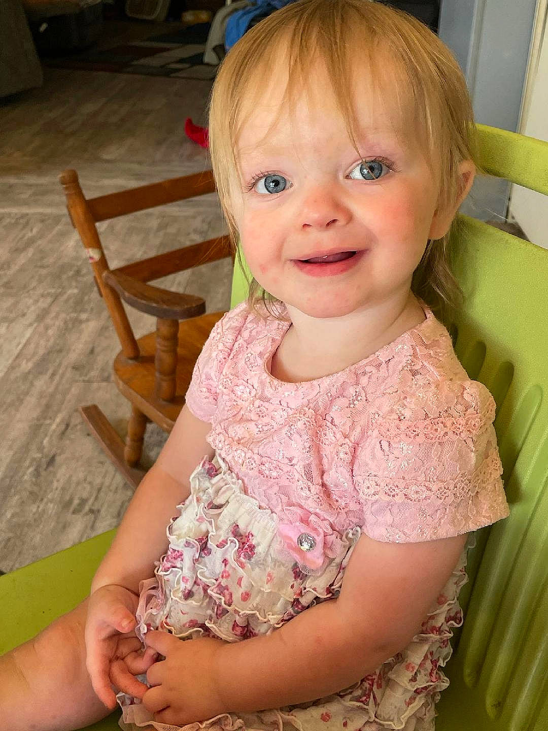 Evangelina joined the competition — help win amazing prizes! baby_toddler_clothing, chair, cheek, chin, dress, eye, eyelash, face, finger, hair, hand, happy, head, iris, joy, organ, person, pink, skin, sleeve