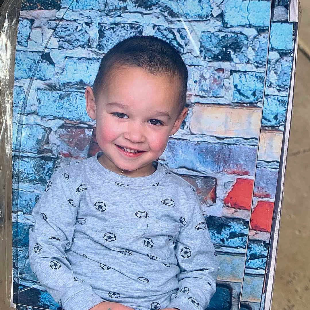 Jordan joined the competition — help win amazing prizes! baby, babylaughing, box, clothing, face, hair, happy, head, person, photoframe, photography, portrait, sitting, sleeve, smile