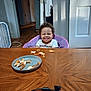 Hayzel is registered to the contest to win money with this photo: architecture, baby, building, cutlery, diningroom, diningtable, face, food, furniture, hardwood, head, indoors, meal, person, photography, plywood, portrait, room, table, wood
