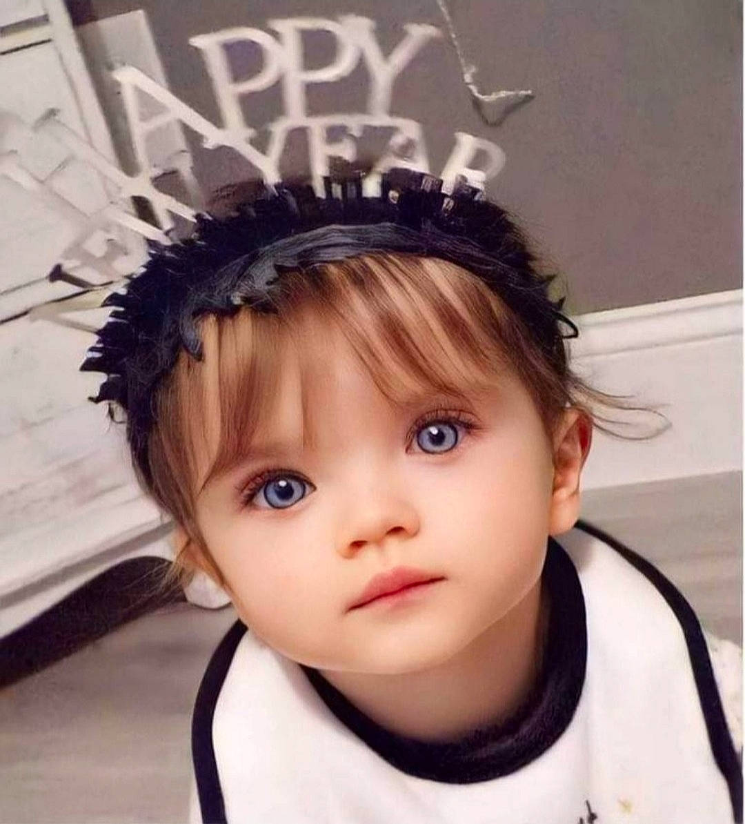 Keslee is registered to the contest to win money with this photo: baby_toddler_clothing, cap, cool, costume_hat, crown, ear, eyebrow, eyelash, fashion_accessory, hair_accessory, hairstyle, happy, headband, headgear, headpiece, helmet, person, personal_protective_equipment, sleeve, toddler