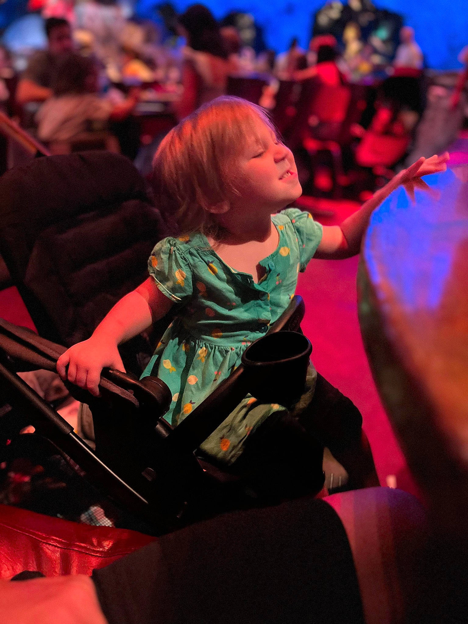 Danni Delilah joined the competition — help win amazing prizes! audience, blue, chair, crowd, entertainment, event, fashion_design, fun, leisure, magenta, music, musical_instrument_accessory, musician, performance, performance_art, performing_arts, person, public_event, purple, sitting