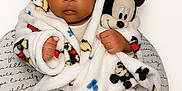Javion joined the competition — help win amazing prizes! baby, child, mickey_mouse, plush_toy, robe, soft_fabric, cute, indoor, portrait, infant, foot, hand, face, expressionless, cozy, pillow, writing, black_hair, cuddly, wrapped