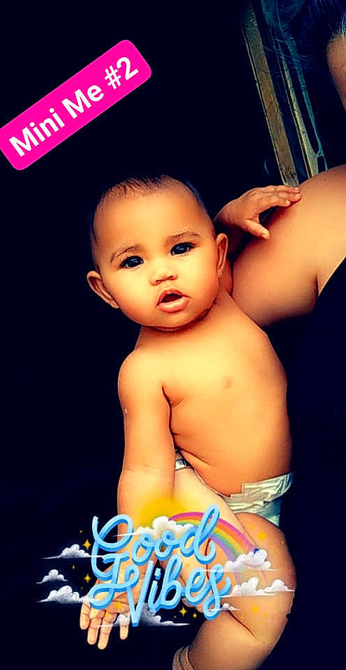 Maryjane is registered to the contest to win money with this photo: baby, black_hair, cheek, chin, eye, eyebrow, eyelash, finger, flash_photography, happy, head, human, iris, lip, mouth, muscle, nose, organ, person, product