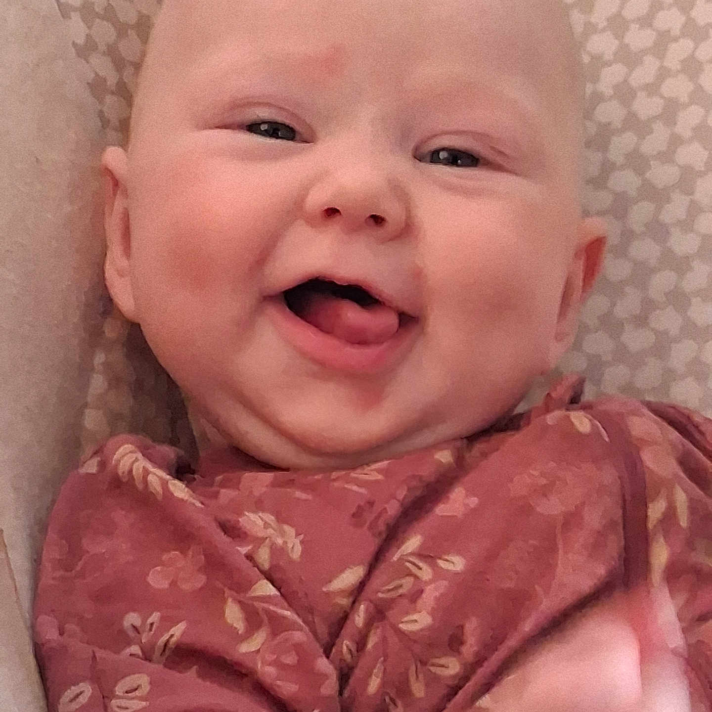 Misty River is registered to the contest to win money with this photo: baby, babylaughing, bodypart, clothing, dress, face, finger, furniture, hand, happy, head, laughing, mouth, newborn, person, photography, portrait, quilt, smile, teeth