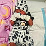 Keniya joined the competition — help win amazing prizes! baby, newborn, hospital_bed, blanket, mittens, hat, clothing, pacifier, infant, cute, lying_down, patterned_clothing, cow_print, white_gloves, bed, pink_blanket, toddler, sleepy, child, soft
