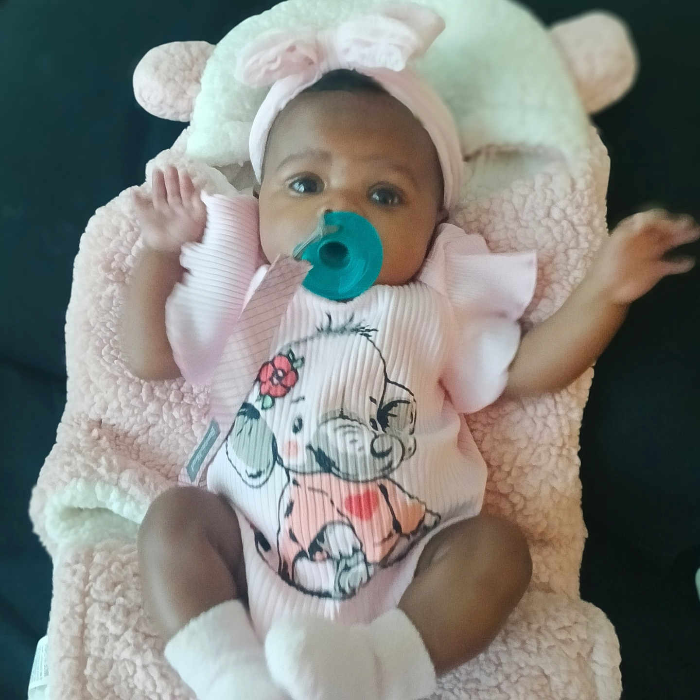 Keniya joined the competition — help win amazing prizes! adorable, baby, baby_clothing, blanket, cartoon_elephant, child, comfort, cute, headband, indoors, infant, lying_down, pacifier, pink_outfit, portrait, sleeping_area, small_hands, soft_texture, toddler, white_socks