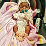 Keniya joined the competition — help win amazing prizes! baby, infant, pacifier, blanket, car_seat, headband, bunny_ears, clothing, sock, cute, cozy, pink, newborn, child, soft, wrapped, indoors, seatbelt, comfort, portrait