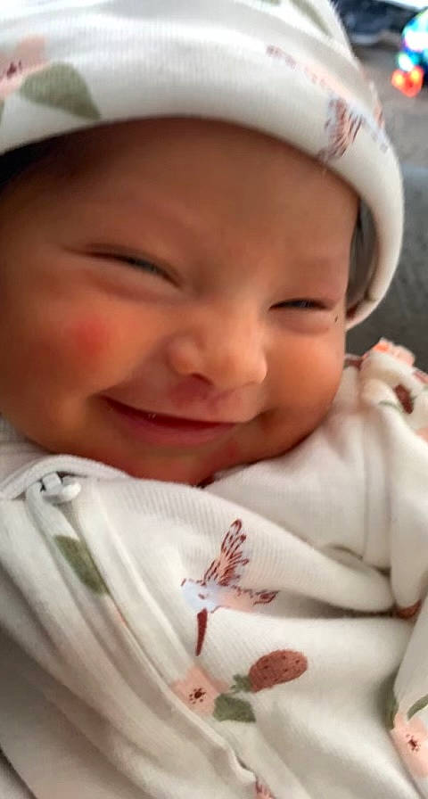 Jayleen is registered to the contest to win money with this photo: baby, cap, cheek, chin, eye, eyebrow, eyelash, facial_expression, finger, happy, headwear, human, iris, lip, mouth, nose, person, pink, product, skin