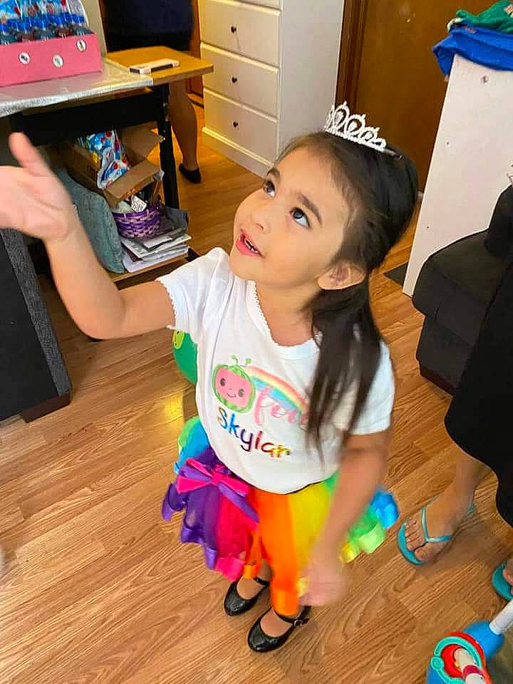 Skylar joined the competition — help win amazing prizes! baby_toddler_clothing, blue, cabinetry, drawer, floor, flooring, fun, happy, hardwood, person, shoe, smile, snapshot, sock, standing, t_shirt, thigh, toddler, varnish, wood