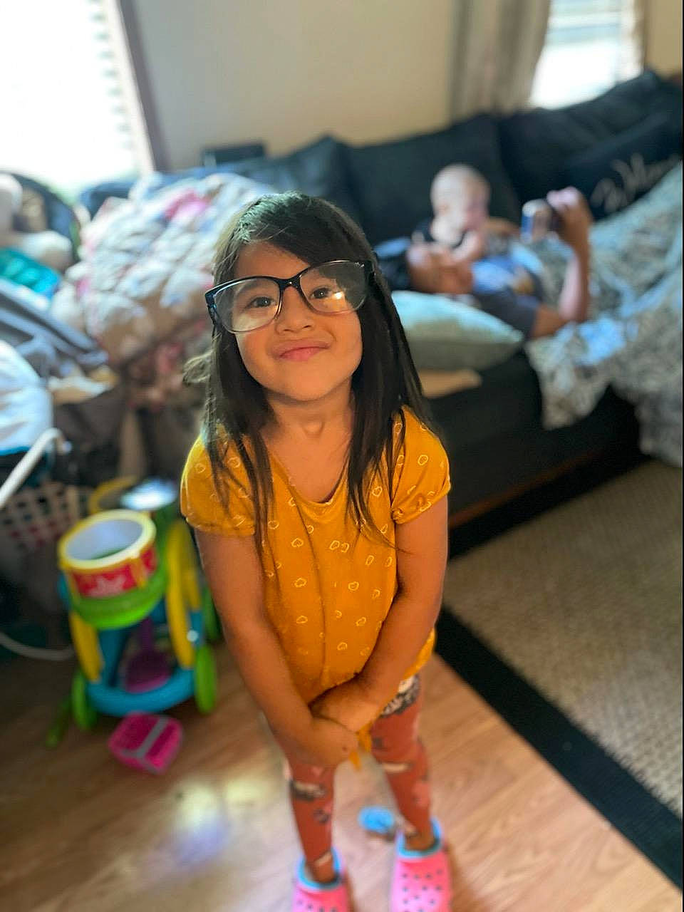 Skylar joined the competition — help win amazing prizes! abdomen, child, event, eyewear, floor, flooring, fun, glasses, happy, human_leg, joy, leisure, party, people, person, photograph, room, sitting, smile, snapshot