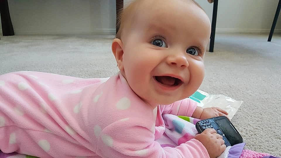 Charity joined the competition — help win amazing prizes! baby, baby_laughing, baby_making_funny_faces, cheek, child, chin, face, facial_expression, happy, head, laugh, lip, mouth, nose, person, pink, skin, smile, toddler