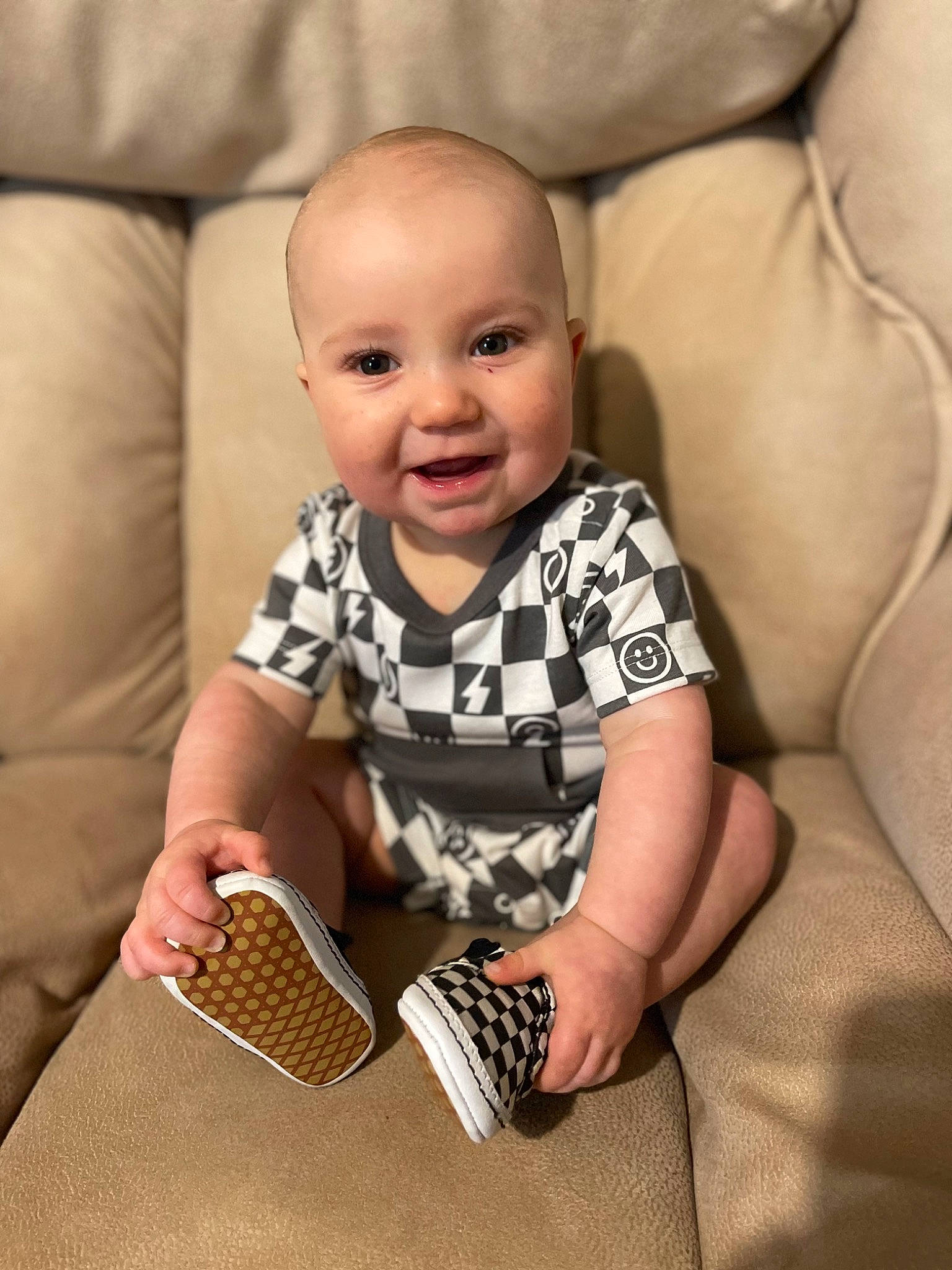 Finley joined the competition — help win amazing prizes! baby, baby_toddler_clothing, child, comfort, facial_expression, finger, flooring, happy, human_body, human_leg, joy, knee, mammal, pattern, person, product, sitting, skin, sleeve, smile