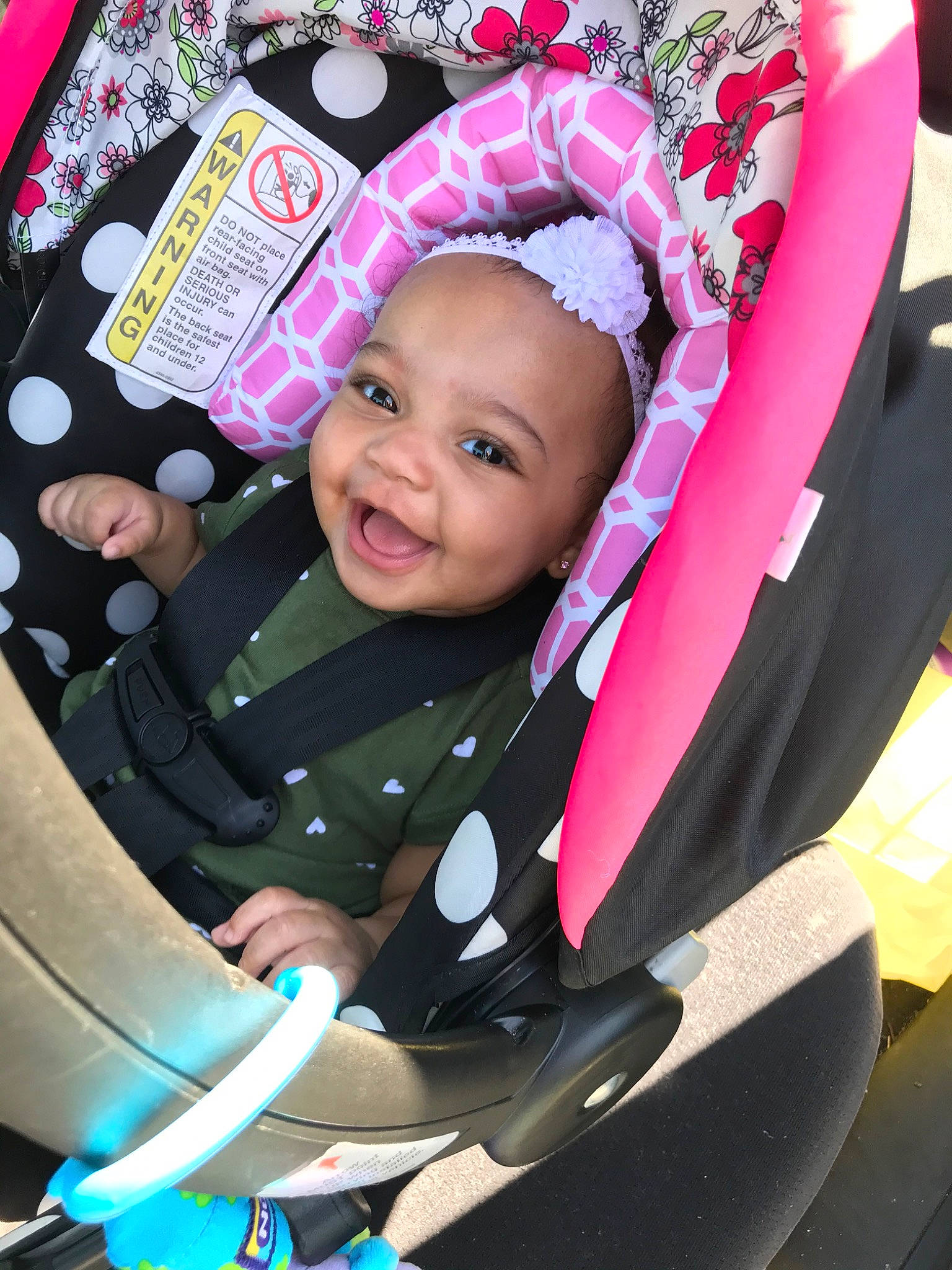 Angelique joined the competition — help win amazing prizes! auto_part, baby, baby_carriage, baby_products, car_seat, child, ear, person, pink, product, smile, toddler