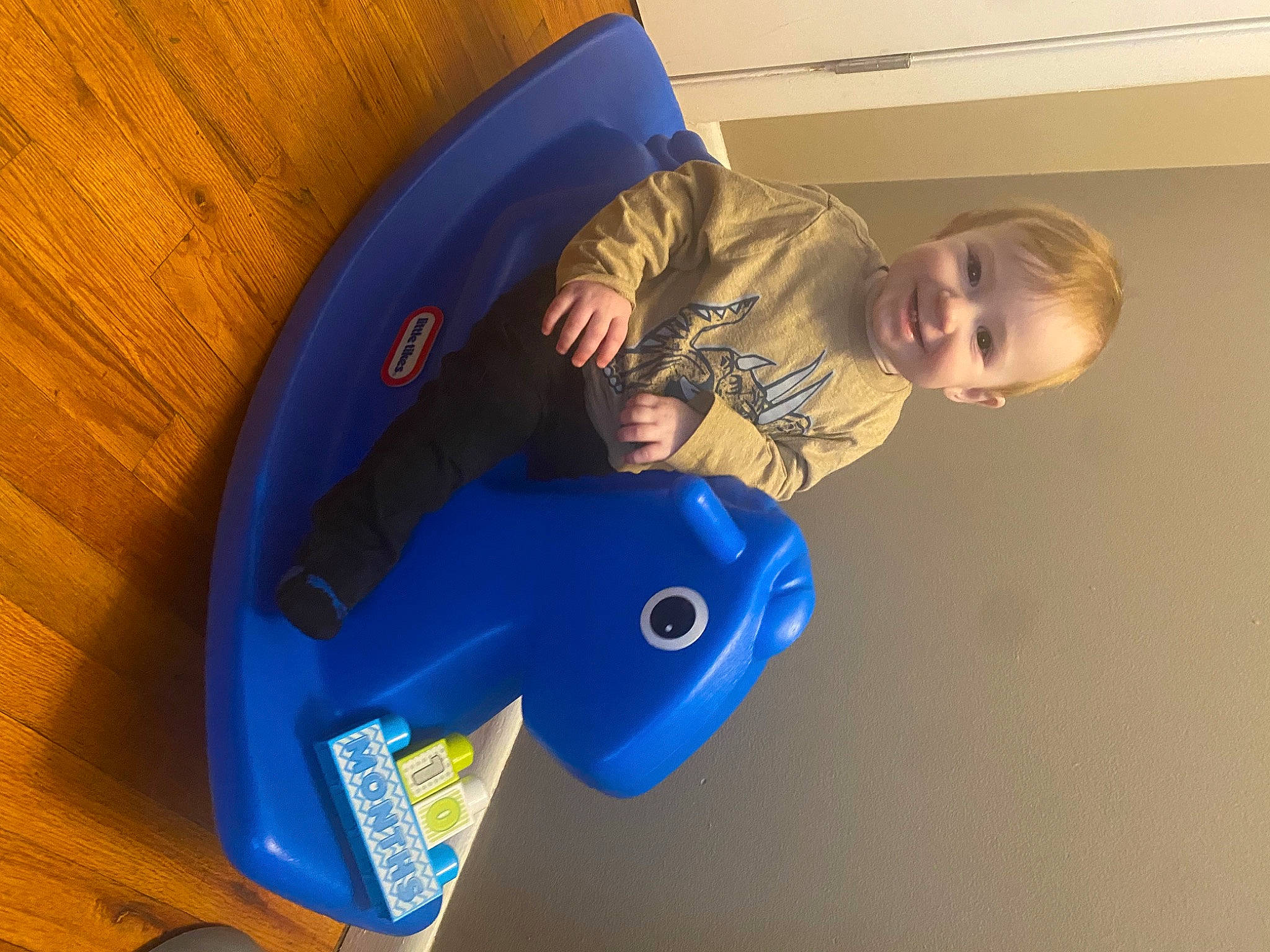 Rhett joined the competition — help win amazing prizes! arm, baby_toys, child, circle, comfort, elbow, electric_blue, flooring, fun, inflatable, joy, leisure, person, personal_protective_equipment, plastic, play, recreation, sleeve, smile, t_shirt