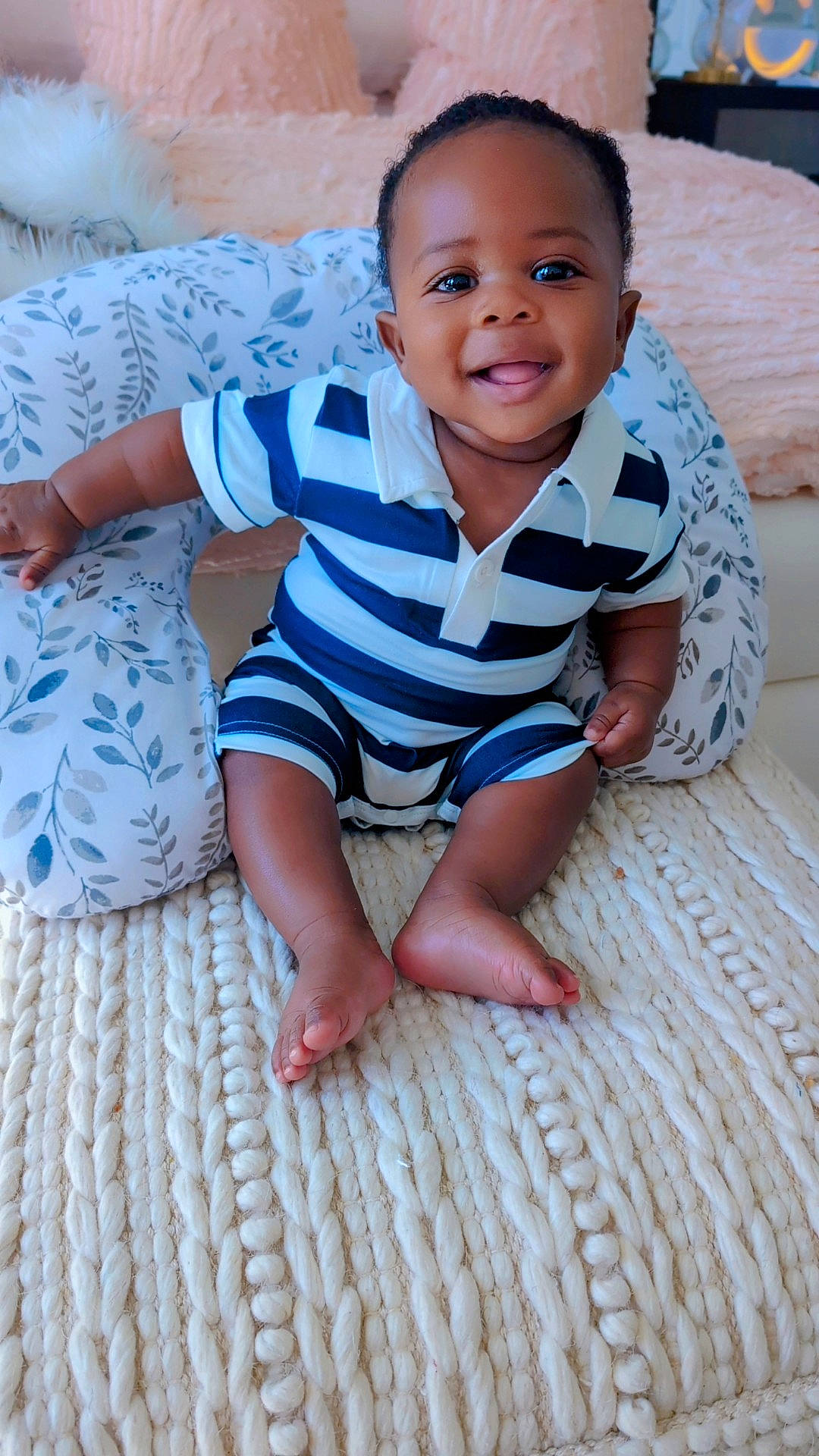 Asher Daniel is registered to the contest to win money with this photo: baby, babylaughing, bed, bedroom, clothing, couch, crawling, cushion, face, furniture, happy, head, homedecor, indoors, person, photography, portrait, room, sitting, smile