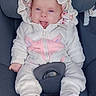 Tia a rejoint le concours — aidez-le/la à gagner de superbes lots ! baby, blue_eyes, buckle, car_seat, closeup, cozy, feet, floral_pattern, hands, harness, hoodie, infant, pink, portrait, seat, smiling, socks, soft_fabric, tongue_out, white