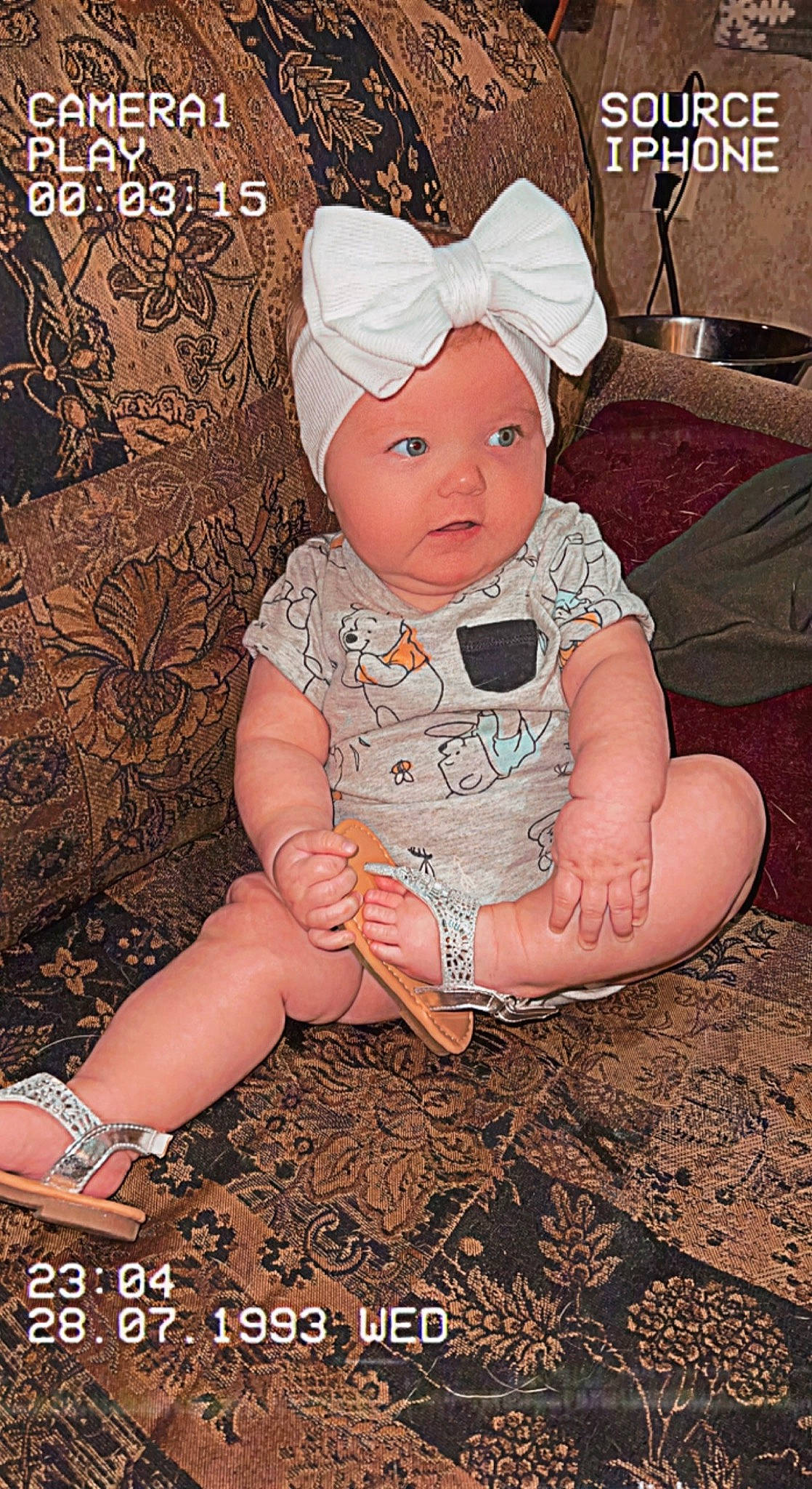 Freya is registered to the contest to win money with this photo: art, baby, baby_toddler_clothing, beanie, cap, cheek, child, costume_hat, eye, fashion_accessory, fun, grass, headgear, headwear, pattern, person, pink, portrait_photography, sitting, sleeve