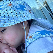 Ashley is registered to the contest to win money with this photo: baby, child, face, hat, sunhat, affection, kiss, closeup, blue, white, skin, person, outdoor, summer, clothing, portrait, love, family, toddler, headwear