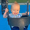 baby, child, toddler, smiling, happy, swing, playground, outdoor, seated, infant, face, portrait, hands, chains, bucket_seat, blue_floor, white_fence, stroller, greenery, photography
