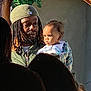 Ezaraye Evans is registered to the contest to win money with this photo: accessories, adult, baby, earring, face, family, female, frown, hair, happy, head, hugging, jewelry, lady, people, person, photography, portrait, sad, woman