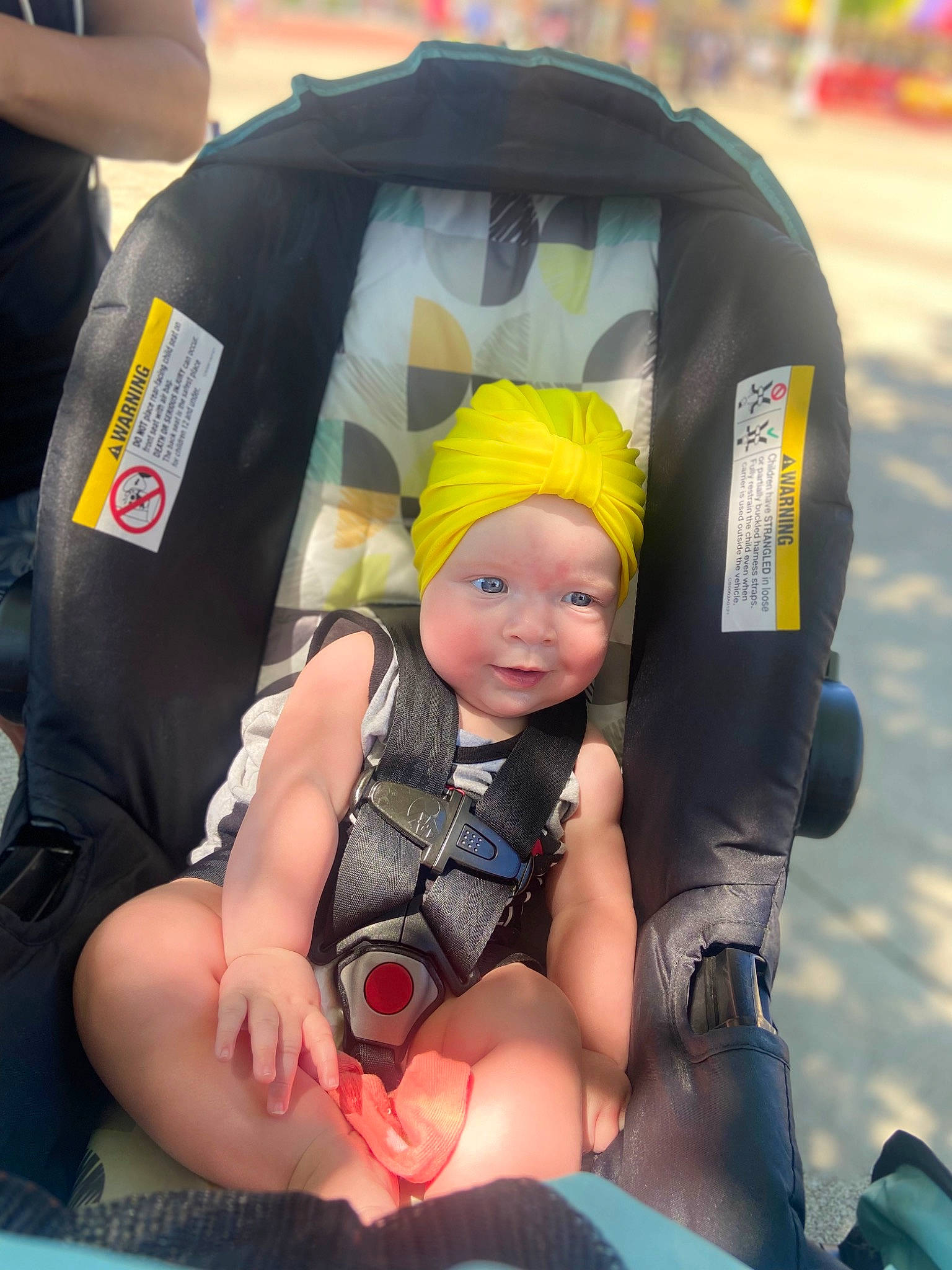 Khaleesi joined the competition — help win amazing prizes! auto_part, baby, baby_carriage, baby_products, baby_safety, baby_toddler_clothing, car_seat, child, comfort, fashion_accessory, fun, happy, headwear, leisure, person, photograph, product, service, sitting, smile