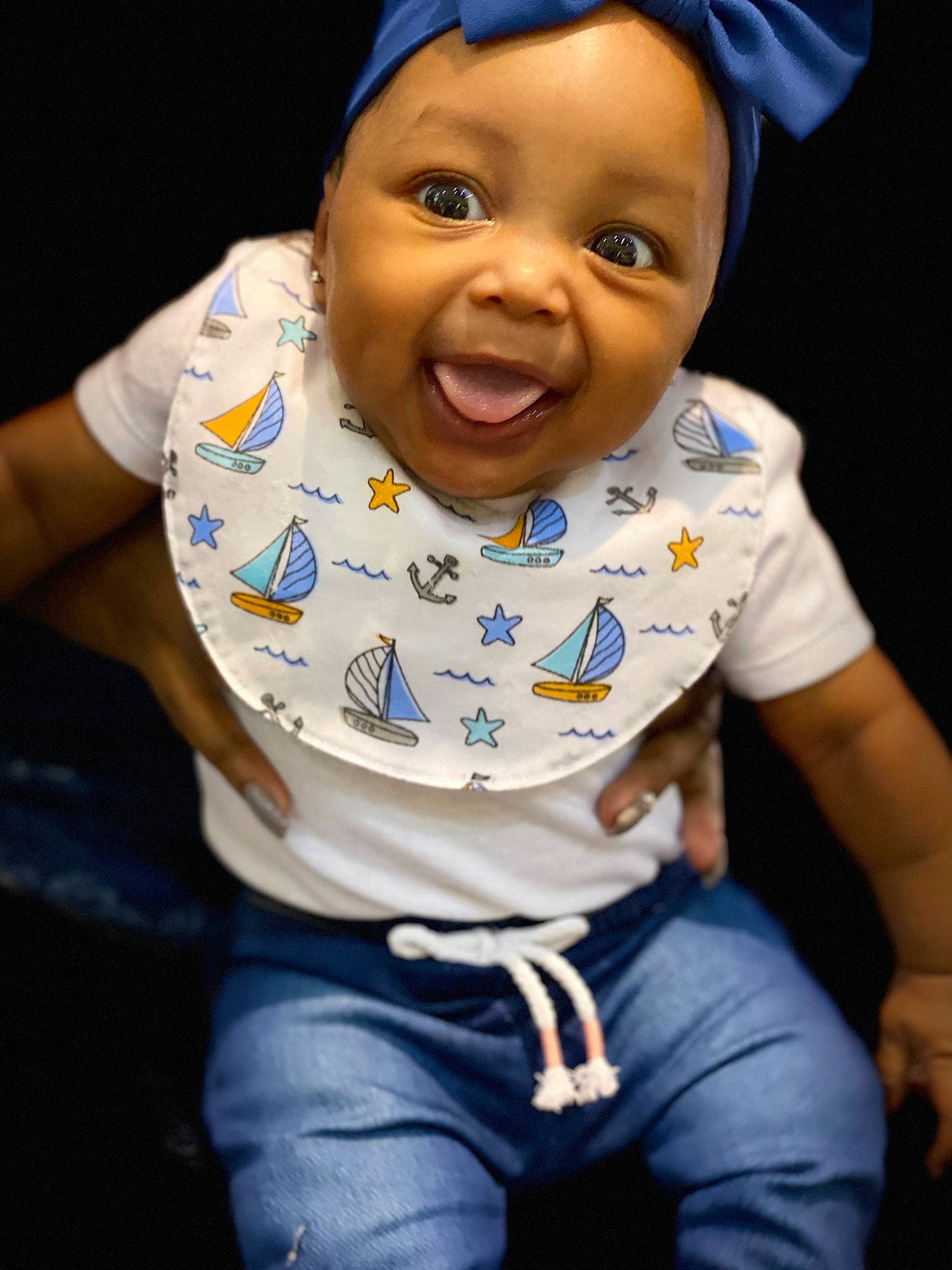 Lauryn is registered to the contest to win money with this photo: baby, cap, cheek, child, cool, facial_expression, fun, happy, head, headgear, laugh, person, photography, smile, toddler