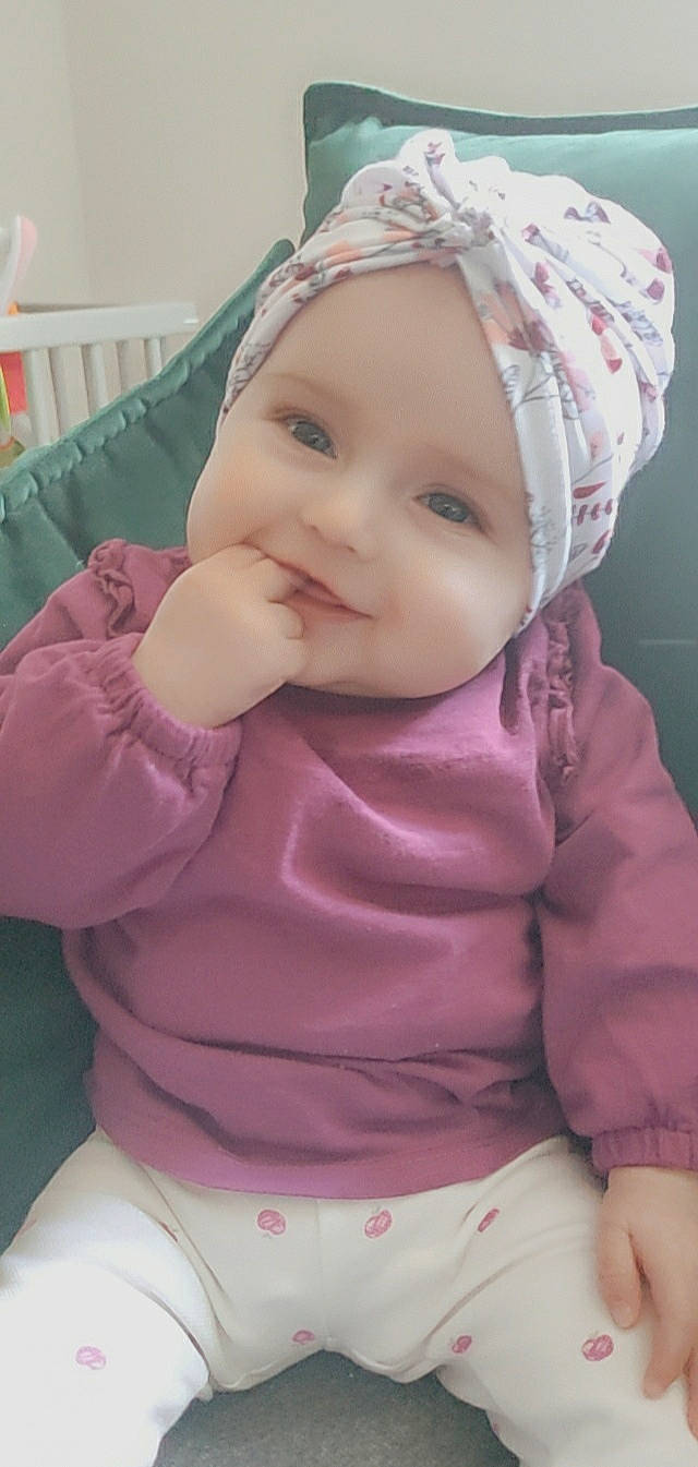 Juliette a rejoint le concours — aidez-le/la à gagner de superbes lots ! baby, baby_toddler_clothing, cap, cheek, clothing, eye, eyelash, happy, headgear, headwear, joy, lip, neck, nose, outerwear, person, pink, purple, skin, sleeve