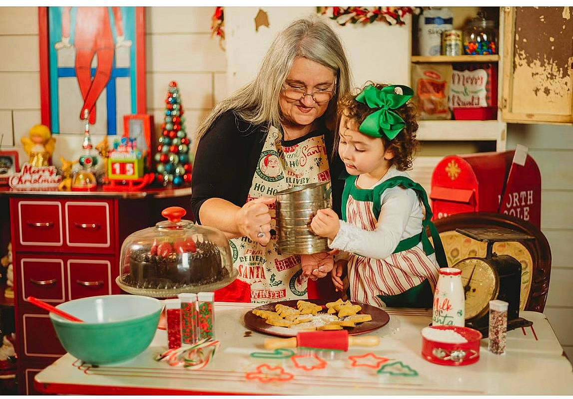 Elaina joined the competition — help win amazing prizes! bowl, child, christmas_eve, cooking, cuisine, cup, dishware, event, food, happy, holiday, interior_design, joy, person, picture_frame, plate, room, serveware, smile, table