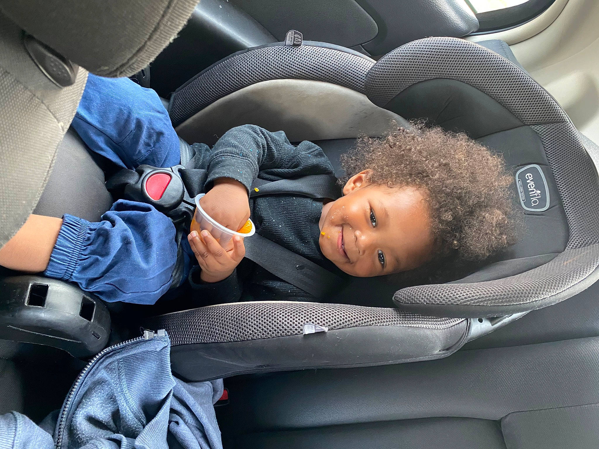 Bryson is registered to the contest to win money with this photo: auto_part, automotive_design, baby_in_car_seat, car, car_seat, car_seat_cover, child, comfort, electric_blue, face, family_car, gesture, head_restraint, joy, motor_vehicle, person, personal_luxury_car, seat_belt, steering_part, steering_wheel