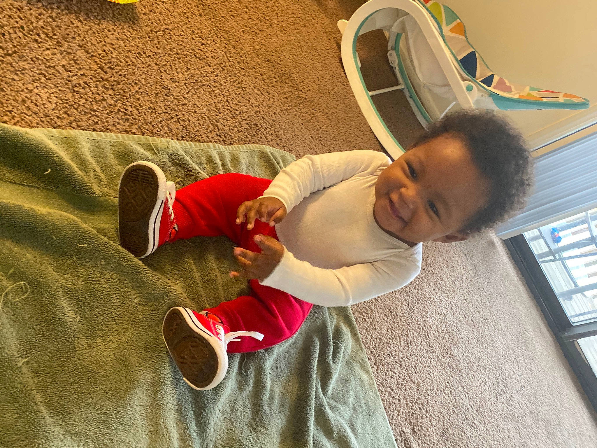 Bryson joined the competition — help win amazing prizes! comfort, couch, elbow, finger, flooring, fun, happy, hardwood, human_leg, joint, joy, knee, leisure, linens, mammal, person, room, smile, sock, thigh